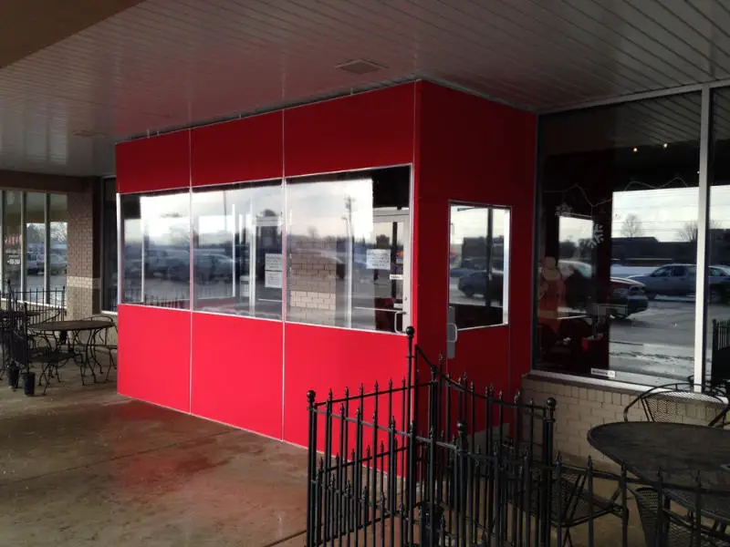 red winter vestibule on front of building