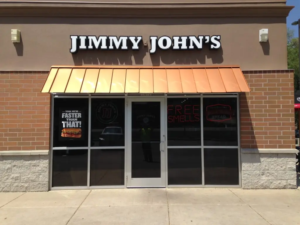 standing seam metal awning on Jimmy John's building