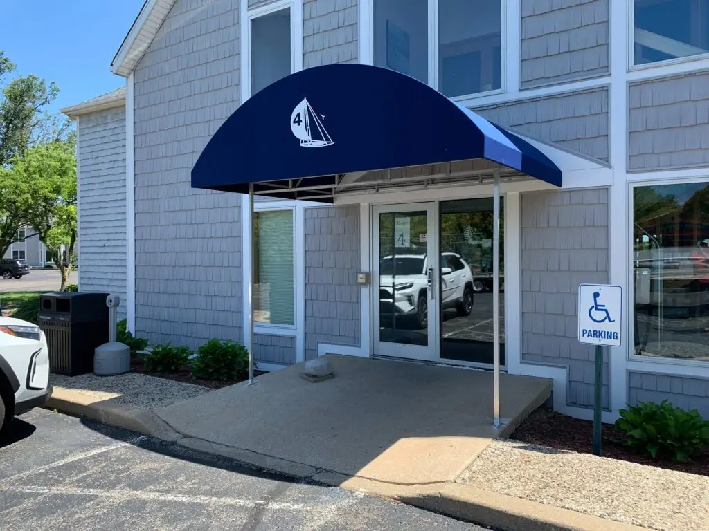 blue awning over doorway