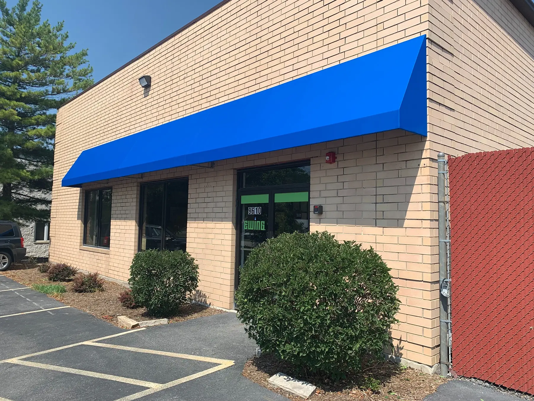 blue canvas awning on building